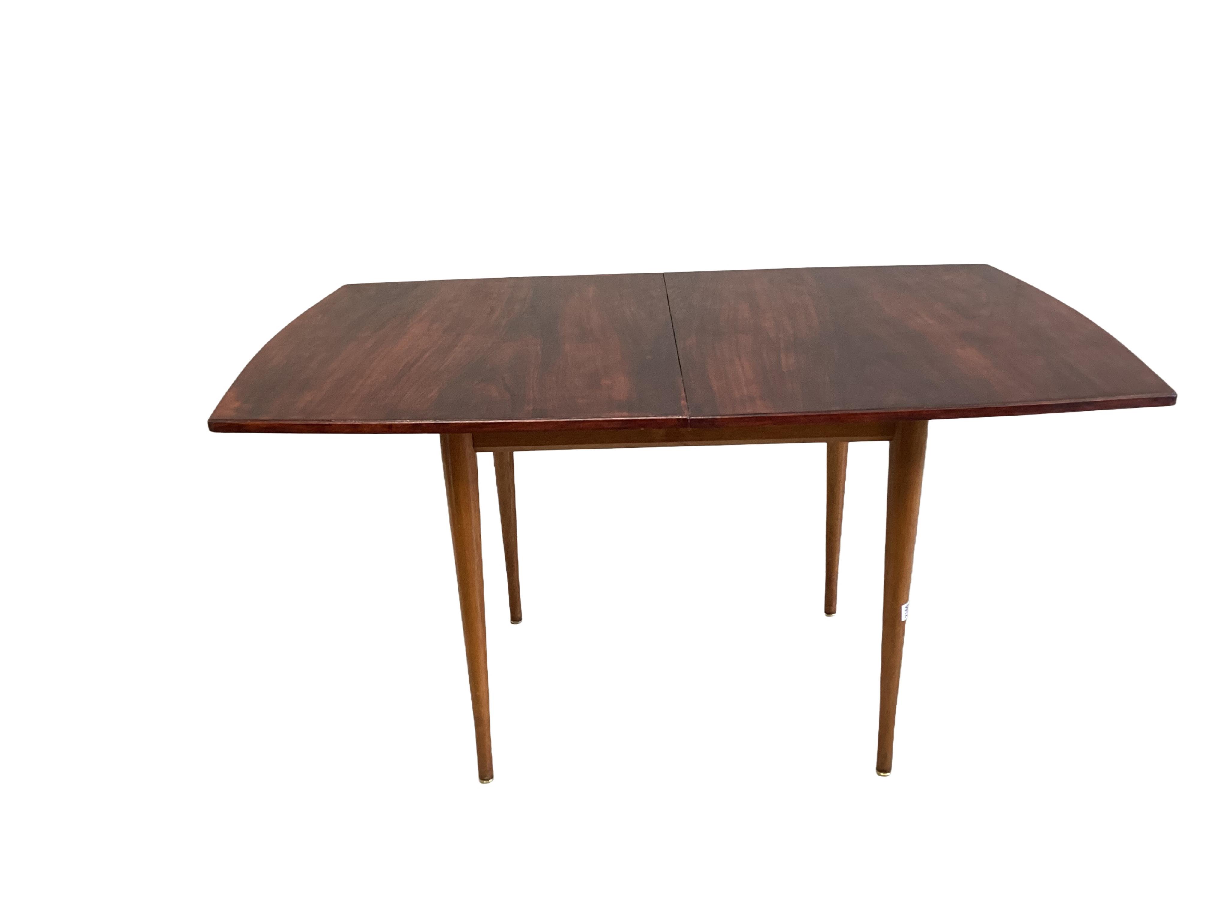 A mid century Younger teak folding, extending dining table, width 70cm, depth 90cm, height 76cm